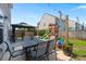 Cozy backyard patio with outdoor dining area, playset, gazebo, and well-maintained lawn at 127 Longford Dr, Summerville, SC 29483