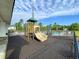 Community playground near the pool with a slide and climbing features for children at 127 Longford Dr, Summerville, SC 29483