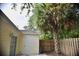 Backyard featuring a wooden fence for privacy and a mature palm tree at 1341 Pinnacle Ln, Charleston, SC 29412
