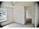 Bright bedroom features a ceiling fan, neutral carpet, and a sun-filled window for a welcoming space at 1341 Pinnacle Ln, Charleston, SC 29412