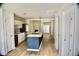 Open-concept kitchen with stainless steel appliances, a central island, and modern finishes at 1341 Pinnacle Ln, Charleston, SC 29412