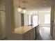 Open-concept kitchen with stainless steel appliances and a spacious island at 1341 Pinnacle Ln, Charleston, SC 29412