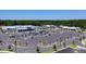 Aerial view of a bustling commercial area with parking and shopping centers at 140 Falaise St, Charleston, SC 29492