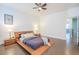Spacious bedroom with a platform bed, dark wood floors, and ample natural light at 1495 Keshi Pearl Dr, Mount Pleasant, SC 29466