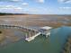 Scenic view of a wooden dock with a gazebo extending into the marsh at 1495 Keshi Pearl Dr, Mount Pleasant, SC 29466