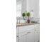 Bright bathroom vanity with granite countertop and neutral fixtures at 1514 Village Sq, Mount Pleasant, SC 29464