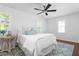 Bedroom with a comfortable bed and a blue patterned rug and lots of light at 1514 Village Sq, Mount Pleasant, SC 29464