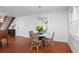 Bright dining area with hardwood floors and a chandelier light fixture at 1514 Village Sq, Mount Pleasant, SC 29464