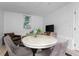 Dining space featuring a round table, four chairs, and a flatscreen television with a view to the exterior at 1514 Village Sq, Mount Pleasant, SC 29464
