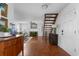 Open-concept living space with hardwood floors and a staircase with an interesting design at 1514 Village Sq, Mount Pleasant, SC 29464