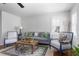 Cozy living room featuring a comfortable sofa and blue-and-white chairs at 1514 Village Sq, Mount Pleasant, SC 29464