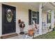 Charming front entrance with a decorative wreath and welcoming ambiance at 1583 Southwick Dr, Johns Island, SC 29455