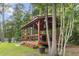 Gazebo featuring a wooden frame, ample seating, and a serene backyard setting at 1583 Southwick Dr, Johns Island, SC 29455