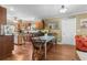 Open kitchen with wooden cabinets, stainless appliances, and breakfast table at 1583 Southwick Dr, Johns Island, SC 29455