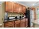 Classic kitchen with wooden cabinets and granite countertops at 1583 Southwick Dr, Johns Island, SC 29455