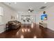 Spacious living room featuring hardwood floors, a ceiling fan, and an open layout perfect for entertaining at 1870 Gammon St, Charleston, SC 29414