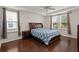 Spacious main bedroom features tray ceiling, hardwood floors, and plenty of natural light at 1870 Gammon St, Charleston, SC 29414