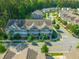 Charming townhomes line a street in this aerial view of a well-maintained community at 1876 Towne St, Johns Island, SC 29455