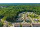Beautiful aerial view of a community with charming homes surrounded by green spaces and trees at 1876 Towne St, Johns Island, SC 29455