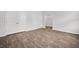 Neutral bedroom featuring hard surface floors and bright, white walls at 1876 Towne St, Johns Island, SC 29455