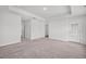 Spacious bedroom with neutral carpet, recessed lighting, and access to the exterior at 1876 Towne St, Johns Island, SC 29455