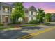 Beautiful exterior view of a townhome with sidewalk and yellow lines at 1876 Towne St, Johns Island, SC 29455