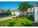 A two-car garage with a black truck parked in front and some grass at 1876 Towne St, Johns Island, SC 29455
