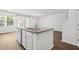 Gourmet kitchen island with a sink, dishwasher, and an open view, perfect for hosting guests at 1876 Towne St, Johns Island, SC 29455
