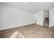Bright living room with hardwood floors and staircase, perfect for entertaining and relaxing at 1876 Towne St, Johns Island, SC 29455