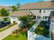 A house with a two-car garage, fenced yard, and green grass showcases suburban living at 1876 Towne St, Johns Island, SC 29455