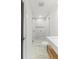 Bathroom featuring a shower with glass door and a toilet at 19 Smith St # D, Charleston, SC 29401