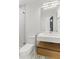Bathroom featuring a toilet, modern sink, a big mirror and a shower with glass door at 19 Smith St # D, Charleston, SC 29401
