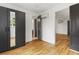 Bedroom featuring a closet, hardwood floor, and a bathroom at 19 Smith St # D, Charleston, SC 29401