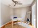 A home office or bedroom provides plenty of natural light, hardwood floors, and an overhead fan at 2 Francis St # I, Charleston, SC 29403