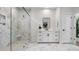 Modern bathroom showcasing a walk-in shower, marble accents, sleek vanity, and contemporary fixtures at 2056 Ten Point Dr, Charleston, SC 29492