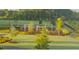 Playground in a park-like setting, featuring various play structures and surrounded by trees and greenery at 2056 Ten Point Dr, Charleston, SC 29492