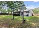 Great yard with a trellis and backyard featuring a screened porch and patio at 210 Basswood Ave, Summerville, SC 29483