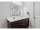 Modern bathroom features a dual sink vanity with dark cabinets and white countertop, offering lots of space at 210 Basswood Ave, Summerville, SC 29483