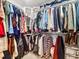 Walk-in closet with ample hanging space for clothes and accessories, providing organized storage at 210 Basswood Ave, Summerville, SC 29483