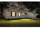 Charming single-story home with cozy porch and well-maintained lawn under a colorful evening sky at 210 Basswood Ave, Summerville, SC 29483