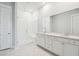 Modern bathroom featuring double vanity, glass shower, and marble floors at 211 Yalton St, Summerville, SC 29486