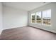 Spacious bedroom with ample natural light and wood floors at 211 Yalton St, Summerville, SC 29486