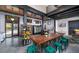 Bright farm store interior with modern fixtures, metal walls, and rustic wooden tables and green stools at 211 Yalton St, Summerville, SC 29486