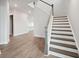 Open staircase with wood treads and white risers at 211 Yalton St, Summerville, SC 29486