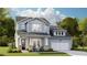 Charming two-story home featuring light blue siding, a welcoming front porch, and an attached two-car garage at 214 Callibluff Dr, Summerville, SC 29486