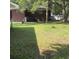 A spacious, fenced backyard featuring an above ground pool, perfect for outdoor enjoyment at 214 Winter St, Moncks Corner, SC 29461