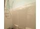 This clean shower space includes sleek white tiles, offering a simple and functional design for everyday use at 214 Winter St, Moncks Corner, SC 29461