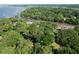 Aerial view of the property showcasing the lush landscaping, river access and the surrounding waterfront community at 2180 Wappoo Hall Rd, Charleston, SC 29412