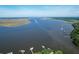 Boats sail down the river near the docks at 2180 Wappoo Hall Rd, Charleston, SC 29412