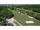 Aerial view of a golf course surrounded by trees at 2180 Wappoo Hall Rd, Charleston, SC 29412